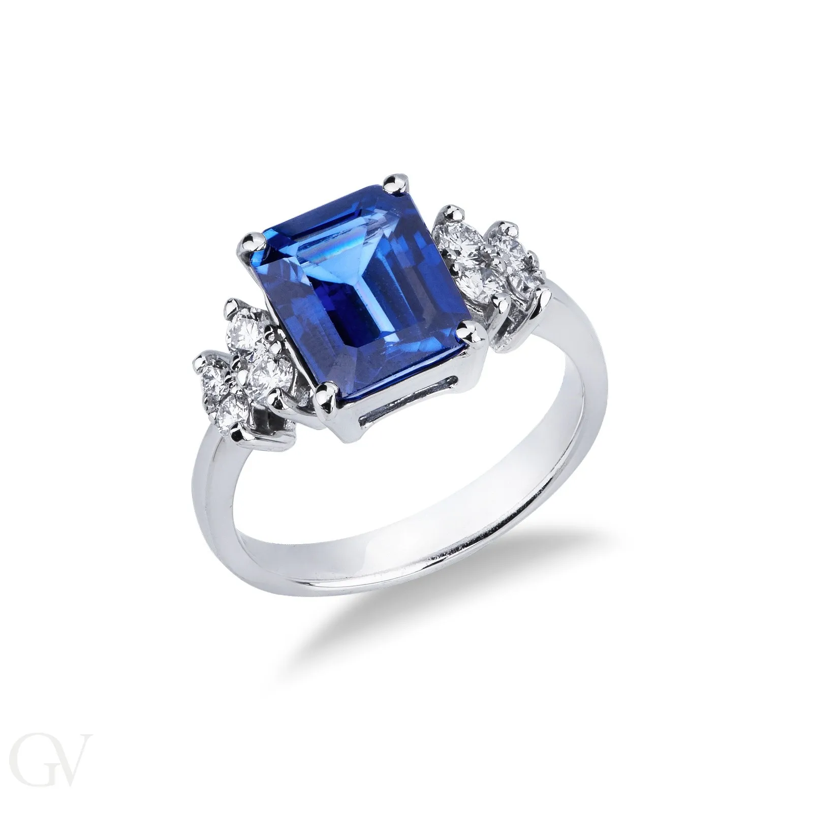 Anello in oro bianco 18k con zaffiro blu rettangolare e diamanti