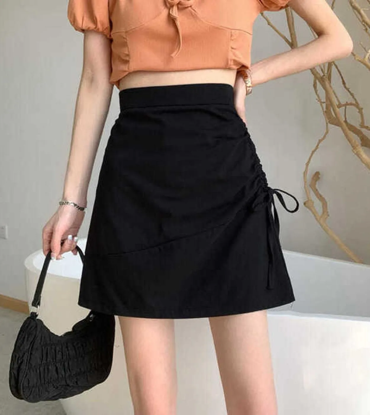 Moda estate donna gonne 2023 arricciatura tinta unita gonna a vita alta linea per ragazze minigonna casual donna