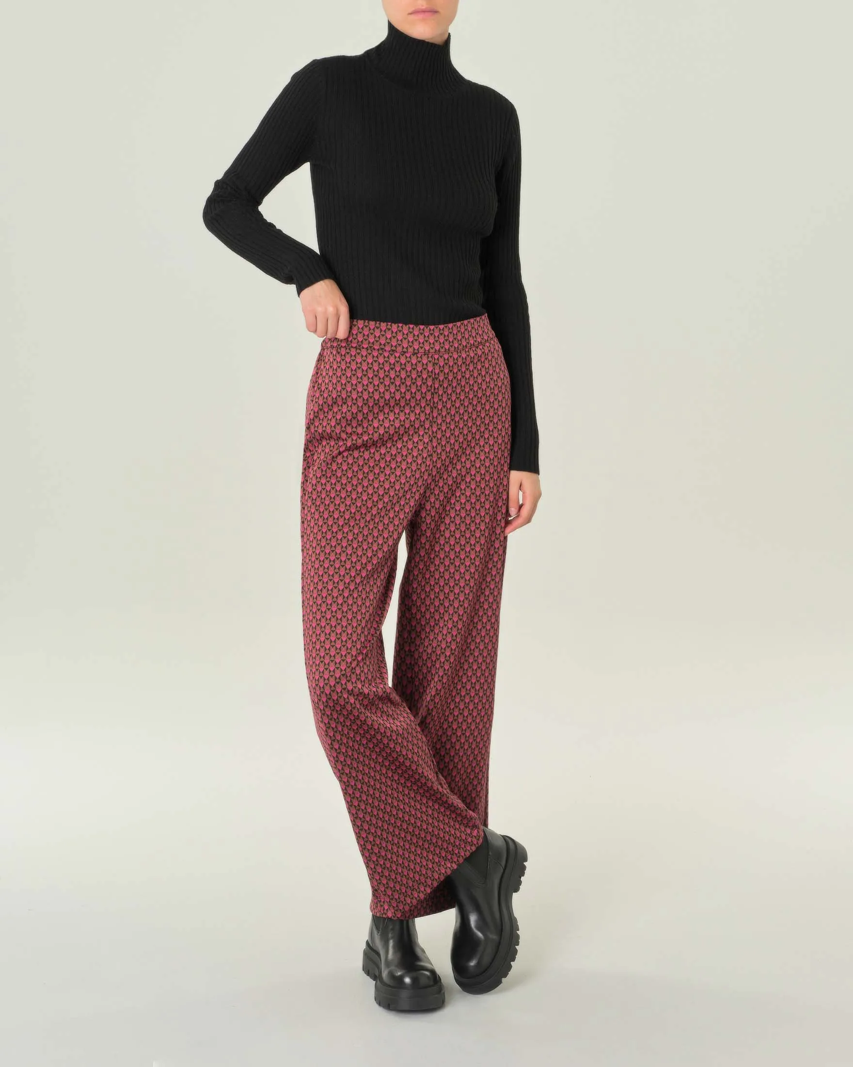 Pantalone palazzo in jersey a fantasia geometrica nera e fucsia
