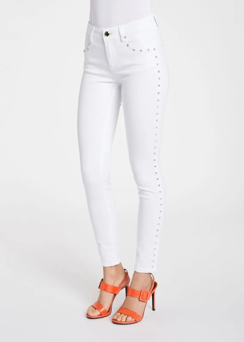Pantaloni skinny con borchie