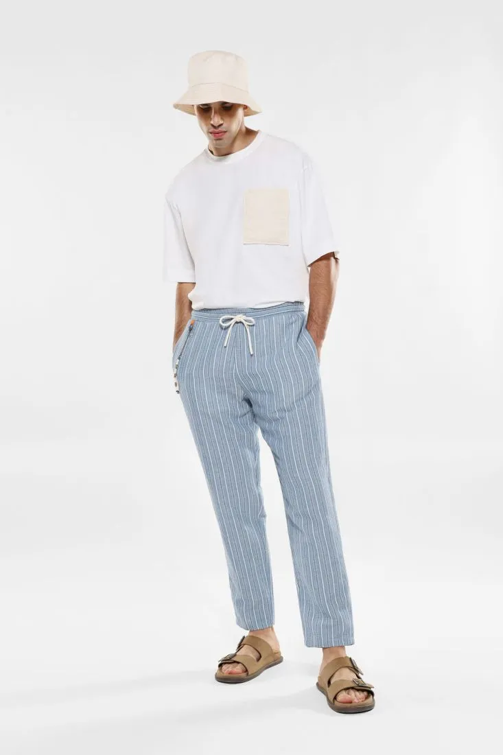 Pantaloni slim-fit fantasia rigata con coulisse e catena