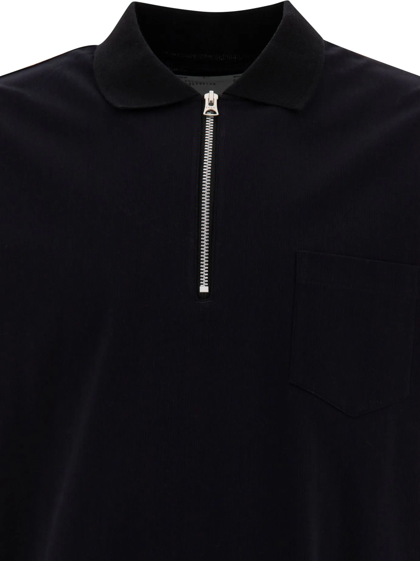Polo con cerniera sacai